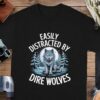 ed65eed2-0449-41e2-aa67-c25716031b00 Easily Distracted By Dire Wolves T-Shirt, Moonlit Forest Wolf Graphic Tee, Perfect Gift for Wolf Lovers, Unique Wildlife Shirt