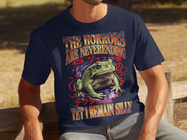 fe092f7d-ec57-46f0-8fdf-10260e399532 Cosmic Frog T-Shirt, The Horrors Are Neverending Yet I Remain Silly, Funny Dark Humor Eldritch Weirdcore Meme Tee
